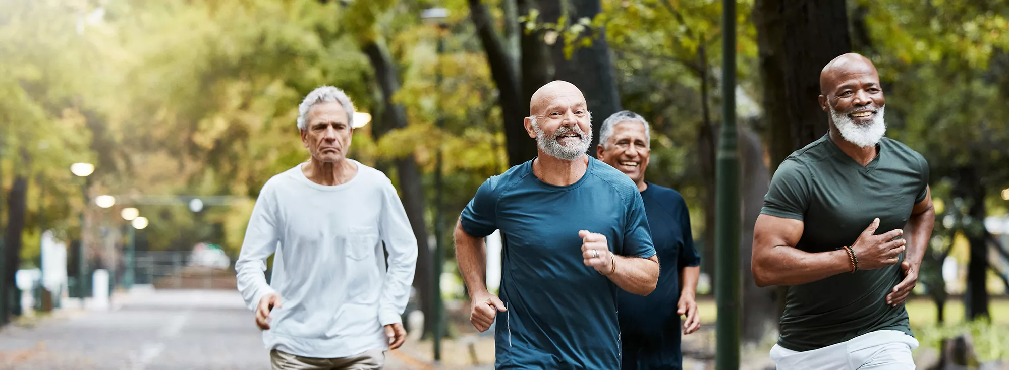 Group of men running happily.